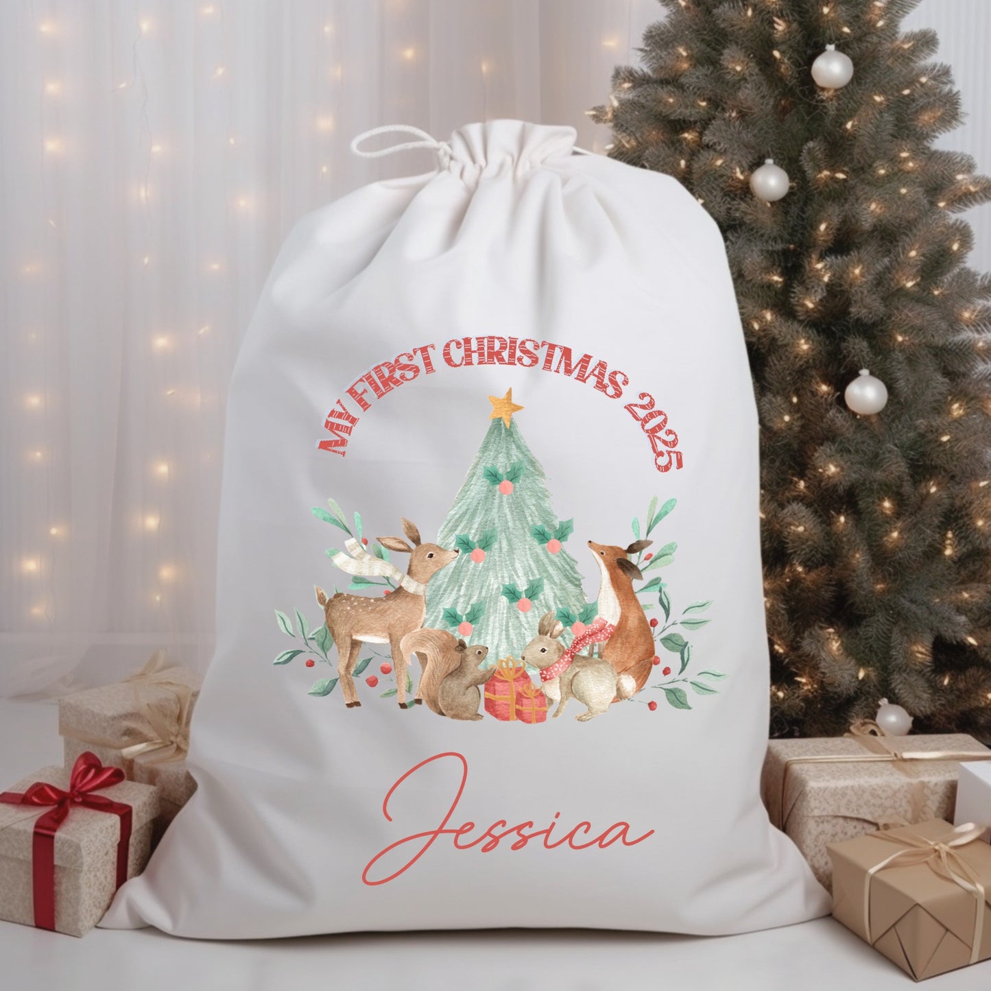 Personalized Christmas gift bag with festive design and text in front of a decorated Christmas tree.