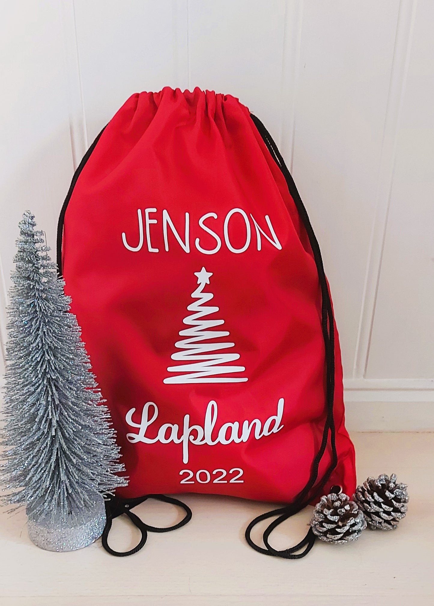 Personalised red Lapland 2025 drawstring bag