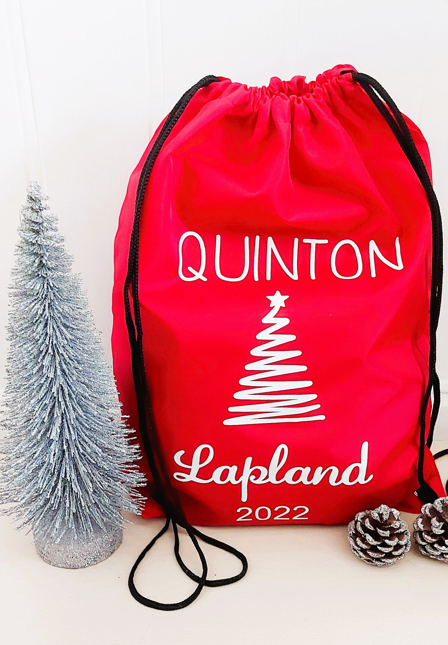 Personalised red Lapland 2025 drawstring bag