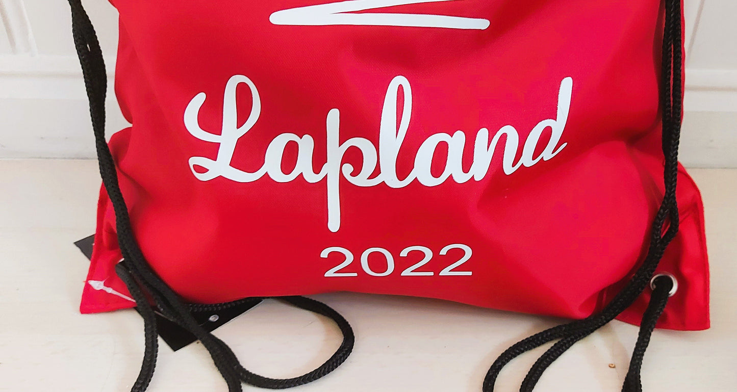 Personalised red Lapland 2025 drawstring bag