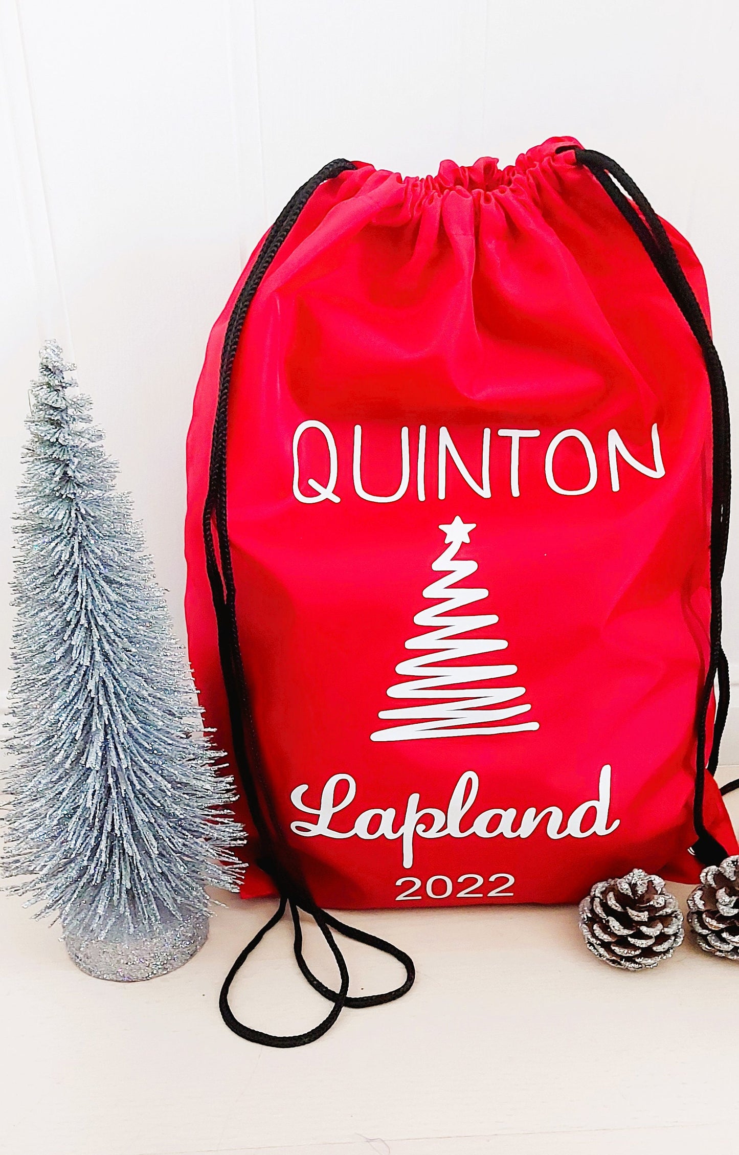 Personalised red Lapland 2025 drawstring bag