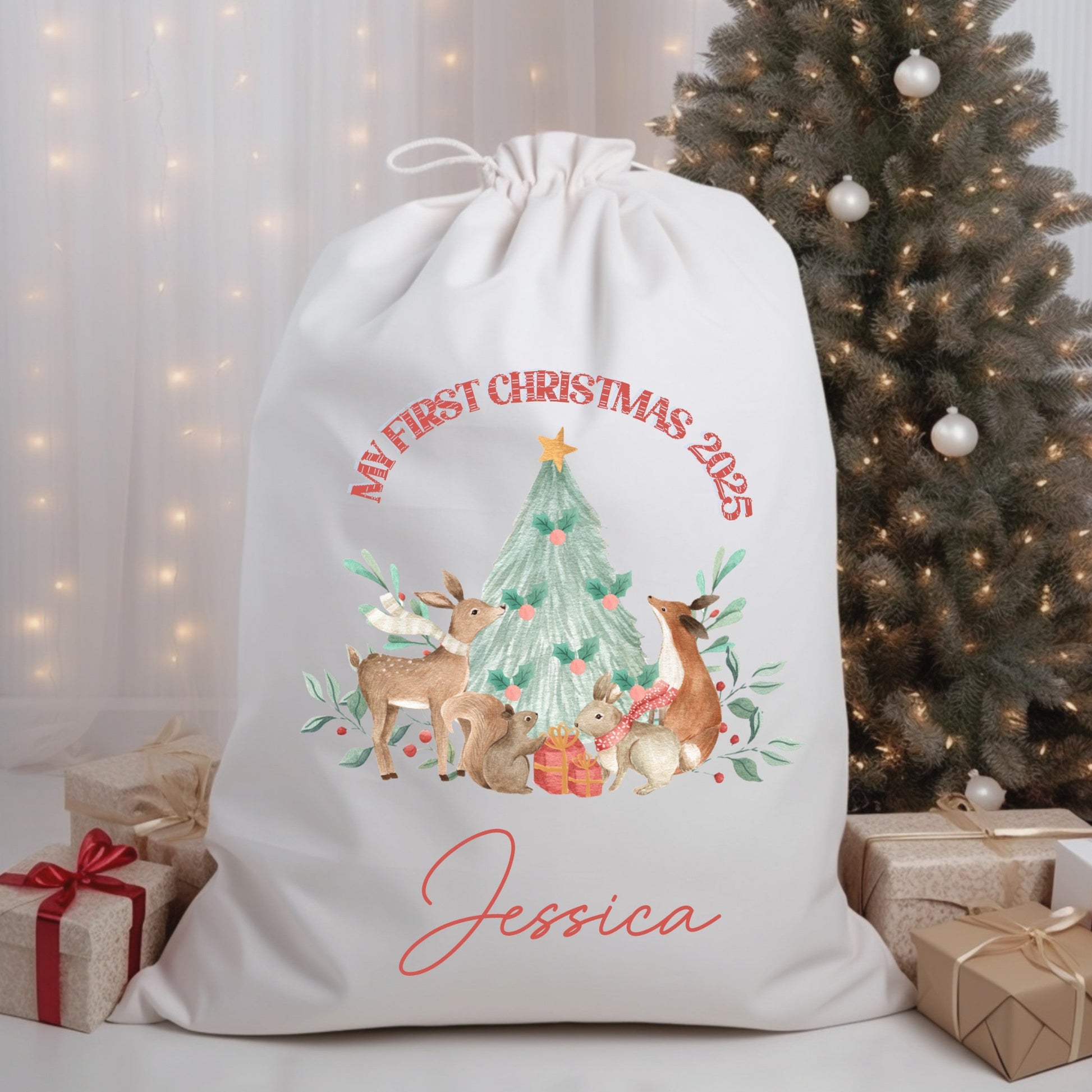 Personalized Christmas gift bag with festive design and text in front of a decorated Christmas tree.