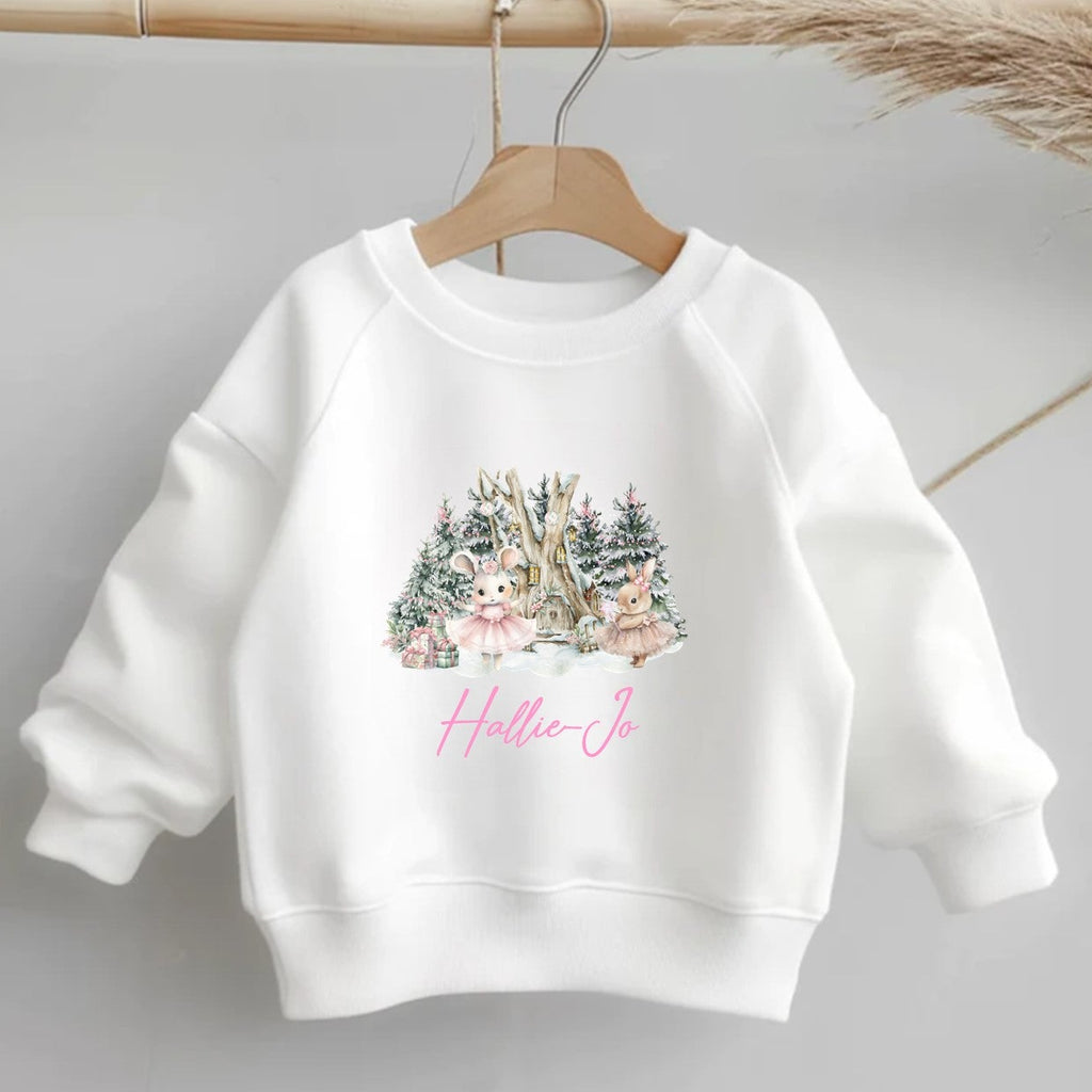 White sweatshirt with a Christmas-themed design and 'Hallie Jo' branding on a gray background.