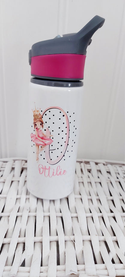 White water bottle with pink top and ballerina design on a white woven surface