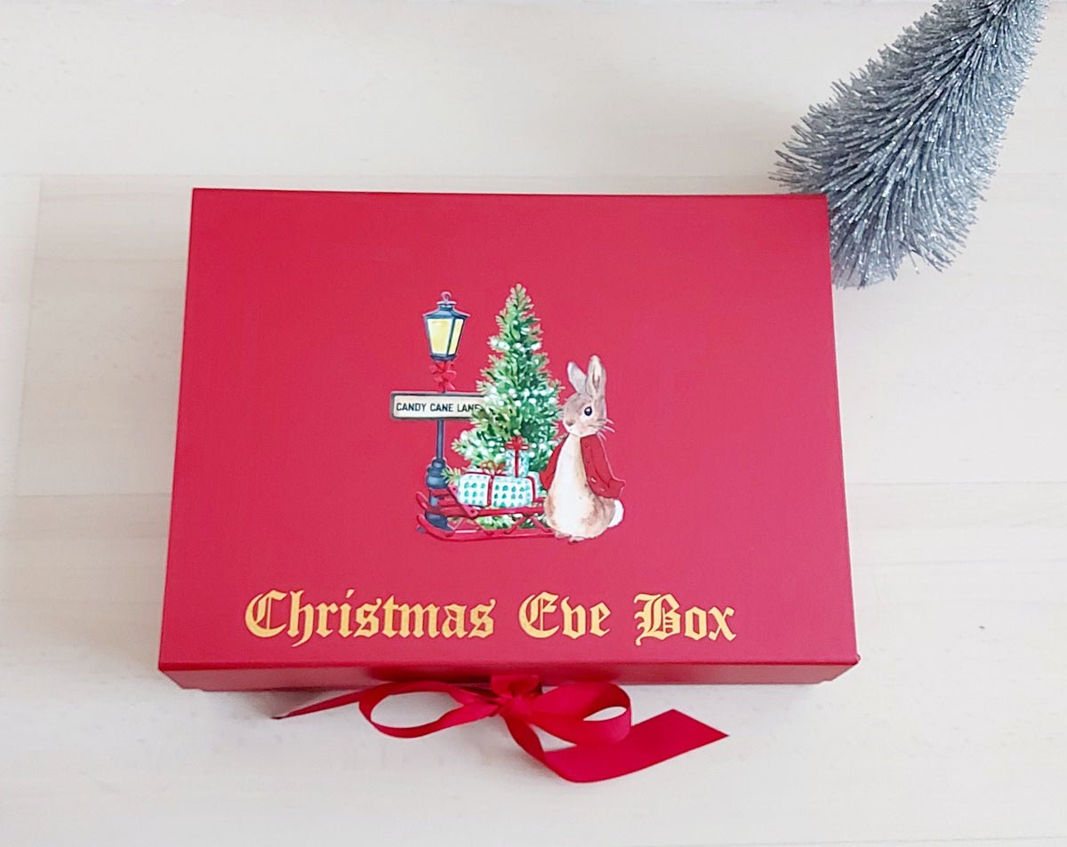 Personalised Peter Rabbit Candy Cane Lane Christmas Eve Box. High quality magnetic gift box