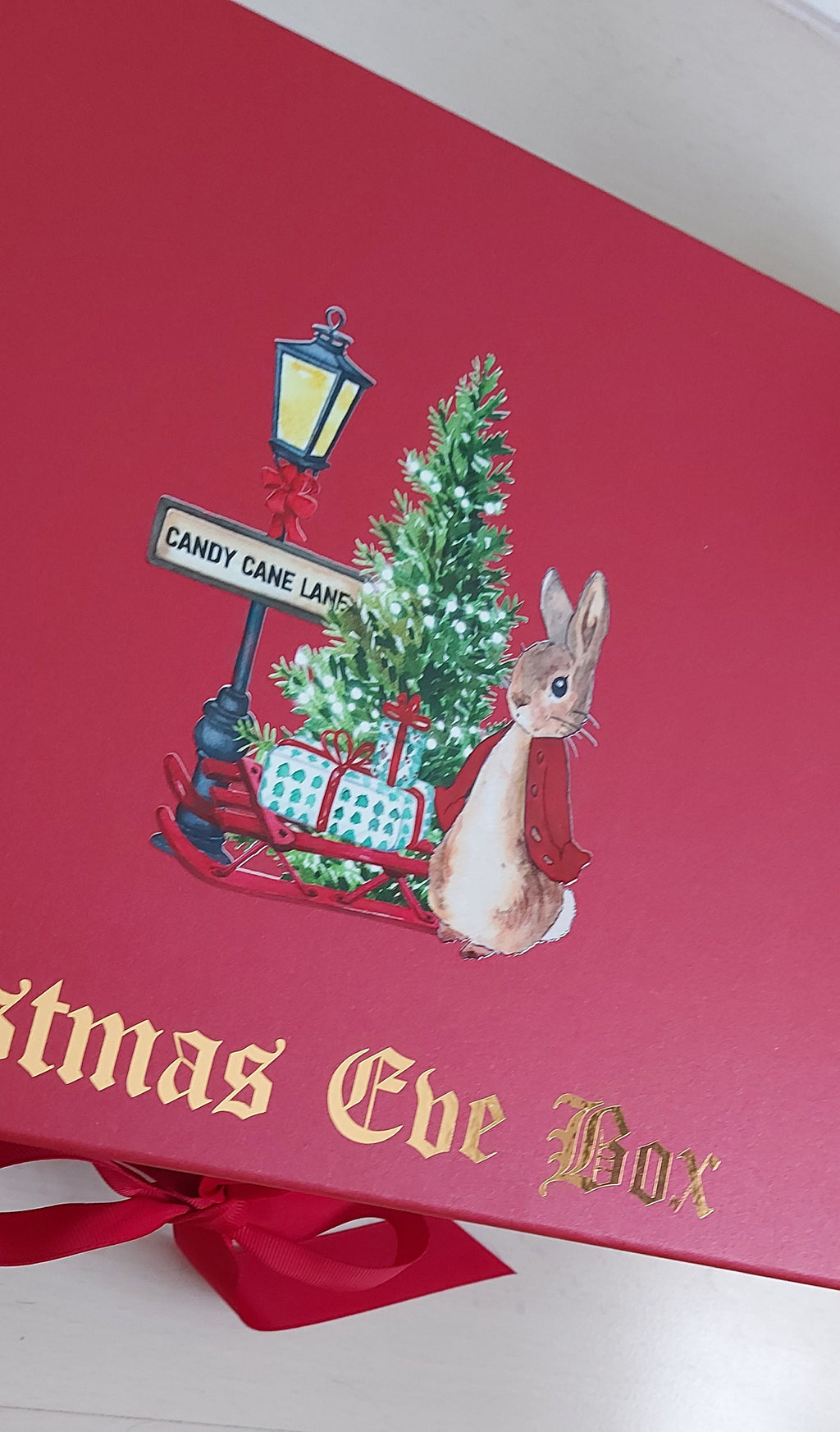 Personalised Peter Rabbit Candy Cane Lane Christmas Eve Box. High quality magnetic gift box