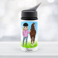 Personalized water bottle with a design of a girl and horse, featuring the name 'Jessica'.