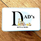 Card with 'Dad's Bits & Bobs' text on a wooden surface