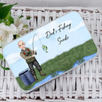 Gift card with a fishing design on a white wicker basket with flowers