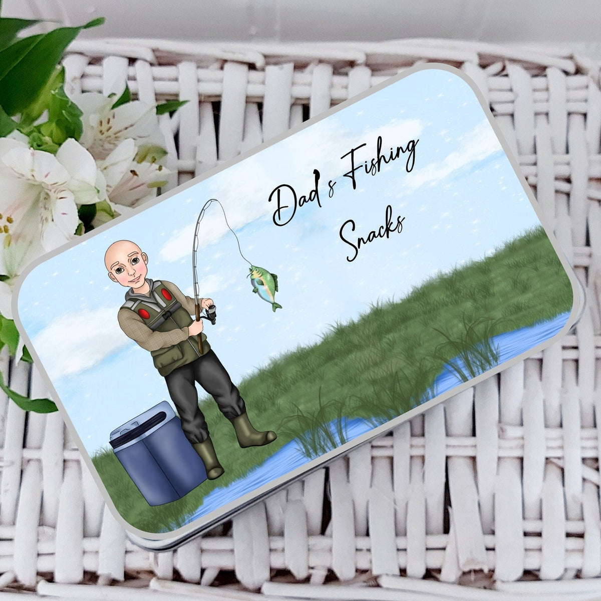 Gift card with a fishing design on a white wicker basket with flowers