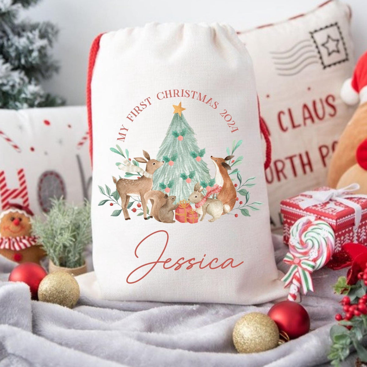 Personalized Christmas gift bag with festive design and text, surrounded by holiday decorations.