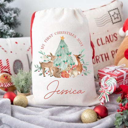 Personalized Christmas gift bag with festive design and text, surrounded by holiday decorations.
