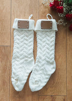 personalised Cream Knit Christmas Stocking with Leather Tag