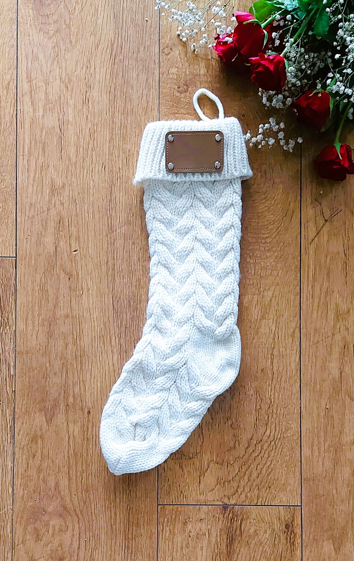 personalised Cream Knit Christmas Stocking with Leather Tag