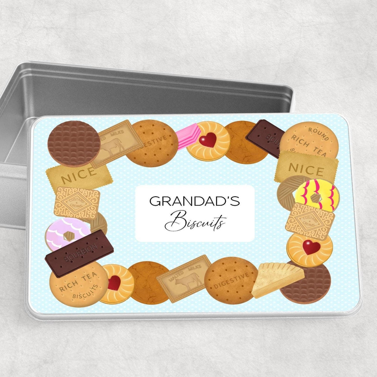 Tin with a decorative label featuring illustrations of various cookies and a 'Grandad's Biscuits' text on a light blue background.