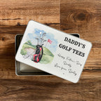 Golf-themed gift tin with 'Daddy's Golf Tees' text on a wooden surface