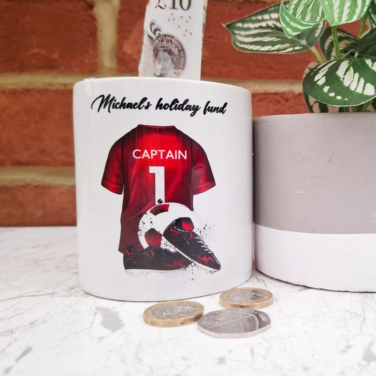 Personalised red football team money box, red football shirt piggy bank, football team colours money pot