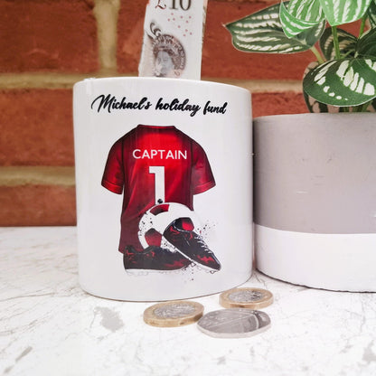 Personalised red football team money box, red football shirt piggy bank, football team colours money pot